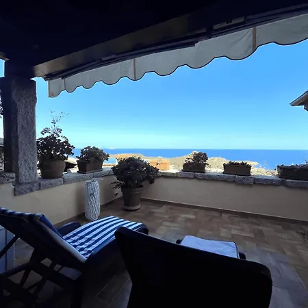Апартаменты Punta Est Quadrilocale Terrazza Favolosa Vista Mare Капо-Кода-Кавальо
